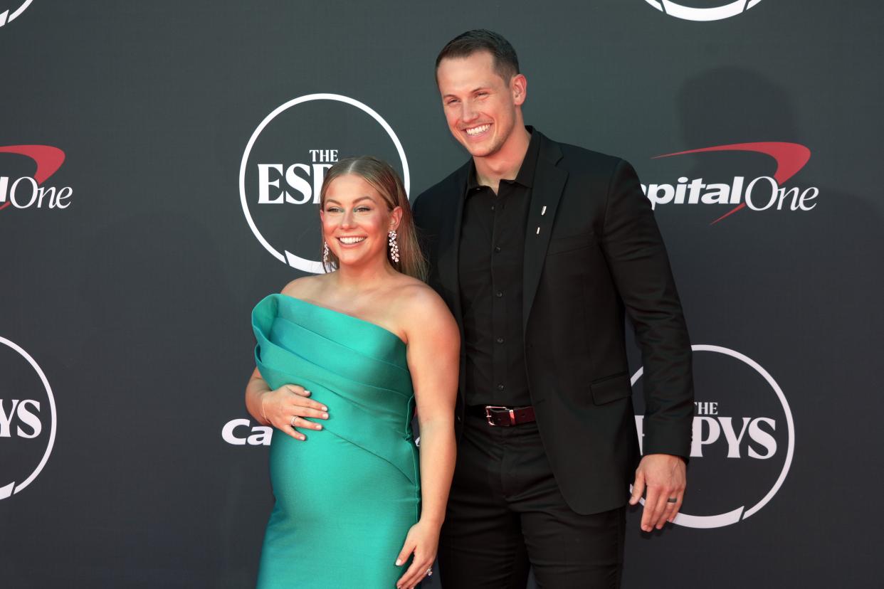 Former Olympic gymnast Shawn Johnson East and Andrew East.