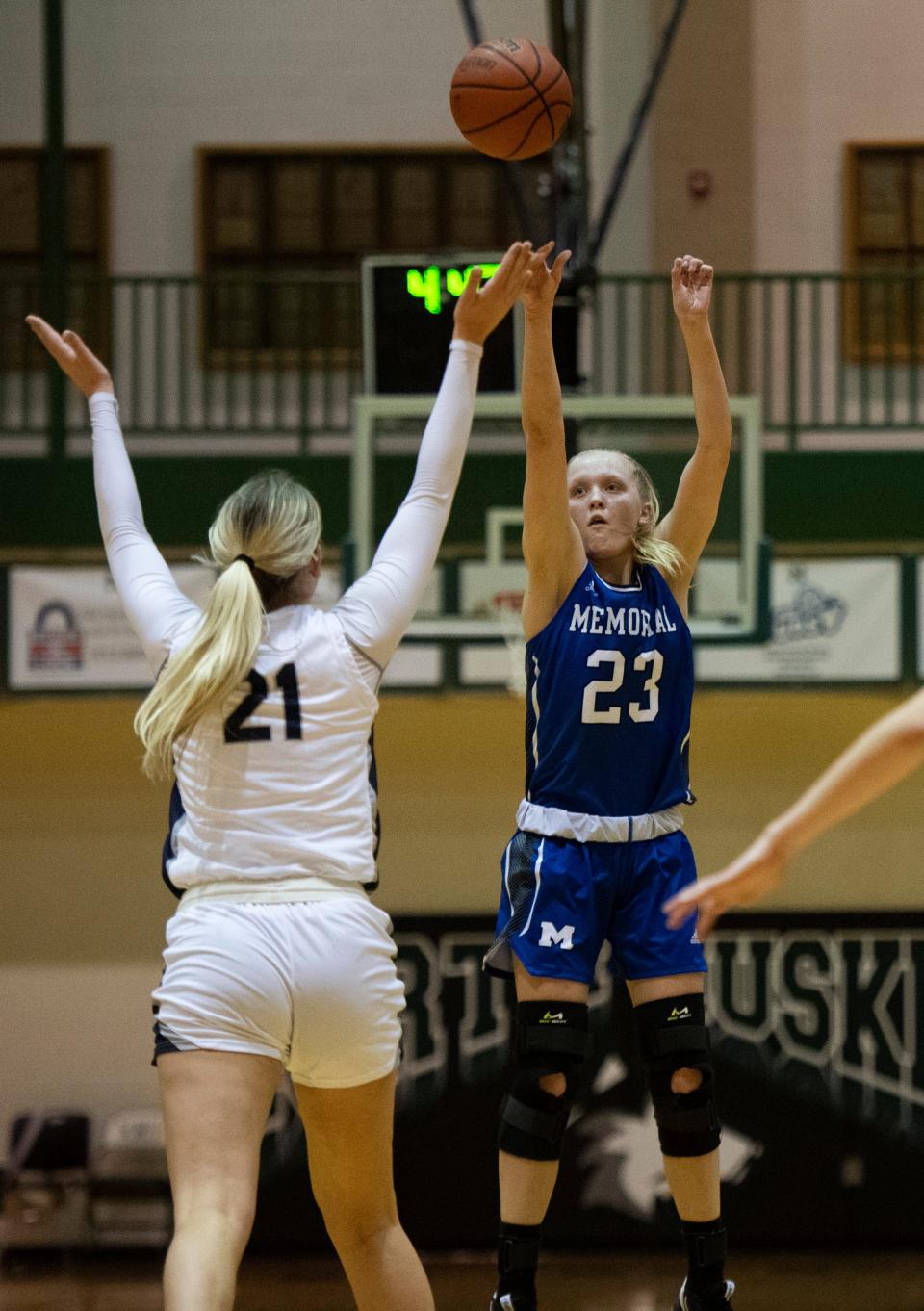 Memorial’s Sophie Johnson (23) takes a three-point shot as the Memorial Tigers play the La Lumiere Lakers during the 2022 Evansville North Showcase at North High School in Evansville, Ind., Friday, Dec. 2, 2022. 