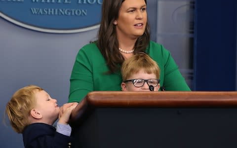 White House Press Secretary Sarah Huckabee Sanders stands with her two sons William and George while taking questions from children during Take Your Child To Work Day, April 26 - Credit:  Mark Wilson/Getty