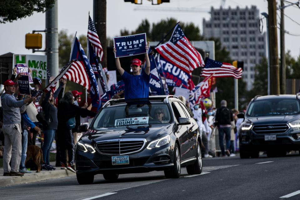 President Trump's supporters rally outside of Walter Reed National Military Medical Center.