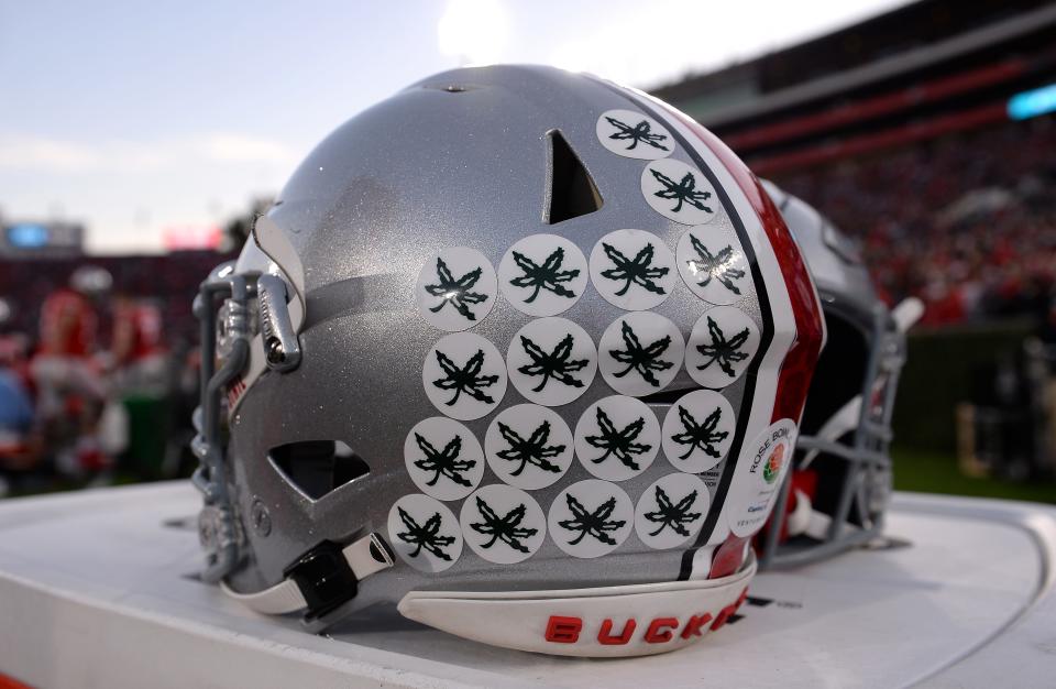 Jan 1, 2022; Pasadena, CA, USA; A detailed view of an Ohio State Buckeyes helmet during the 2022 Rose Bowl college football game between the Buckeyes and the Utah Utes at the Rose Bowl. Mandatory Credit: Orlando Ramirez-USA TODAY Sports