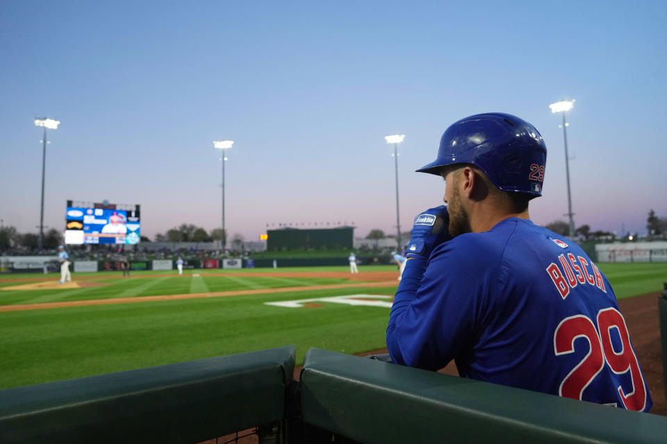 Michael Busch waits in the hole during a spring training game against the Royals.