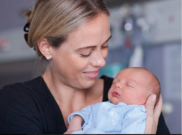 Sylvia Jeffreys holding her baby son