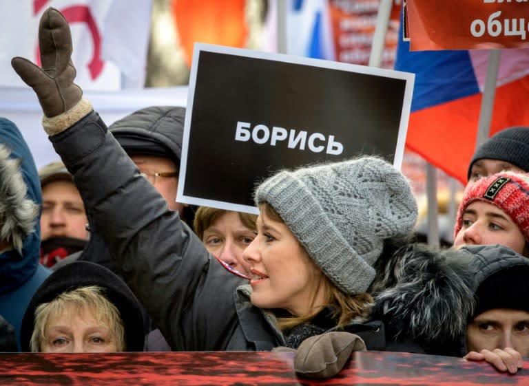 The former TV journalist joined an opposition march in memory of murdered Kremlin critic Boris Nemtsov in February