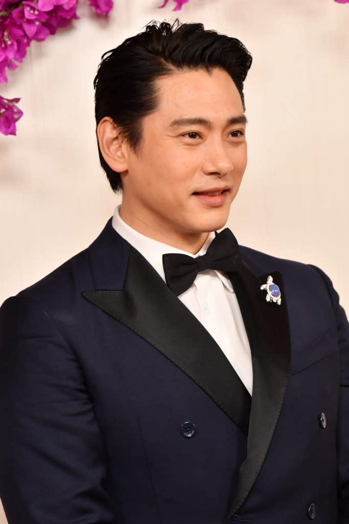 Teo Yoo, who starred in the Best Picture nominee “Past Lives,” revealed that he wore a turtle pin to the 2024 Oscars on Sunday in memory of his pet tortoise who died in August 2023. Sarah Morris/WireImage