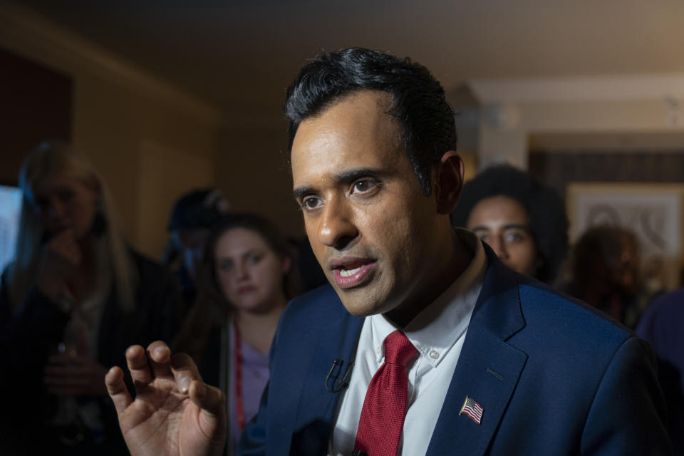 FILE - Vivek Ramaswamy speaks with the Associated Press with supporters nearby, at the Conservative Political Action Conference, CPAC 2023, March 3, 2023, at National Harbor in Oxon Hill, Md. Top Republicans, including some of former President Donald Trump’s potential rivals for the party’s nomination, rushed to his defense on Saturday after Trump said he is bracing for possible arrest. Ramaswamy, the conservative tech investor who is already a declared candidate, called on the DA to “reconsider." (AP Photo/Alex Brandon, File)