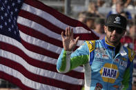 Driver Chase Elliott (9) waves to fans before a NASCAR Cup Series auto race at Atlanta Motor Speedway on Sunday, July 9, 2023, in Hampton, Ga. (AP Photo/Brynn Anderson)