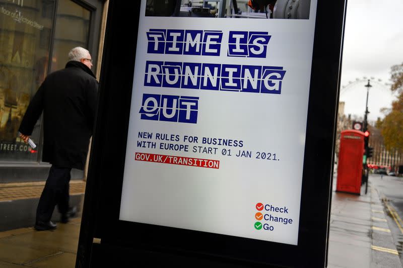 FILE PHOTO: Electronic billboard displays a British government information message, in London