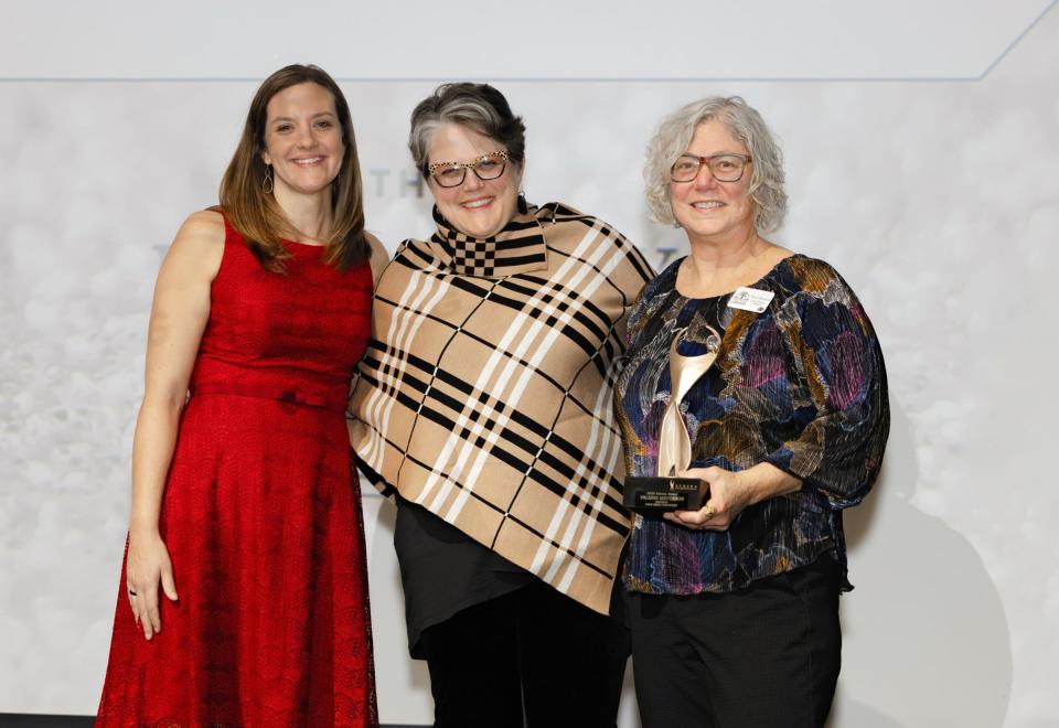 2023 Athena Award winner Valerie Meyerson (right) is pictured with presenters Megan Swadling (left) and and Jennifer Shorter, 2022 Athena Award winner at the 2023 Celebration of Champions on Wednesday, Dec. 13, 2023.