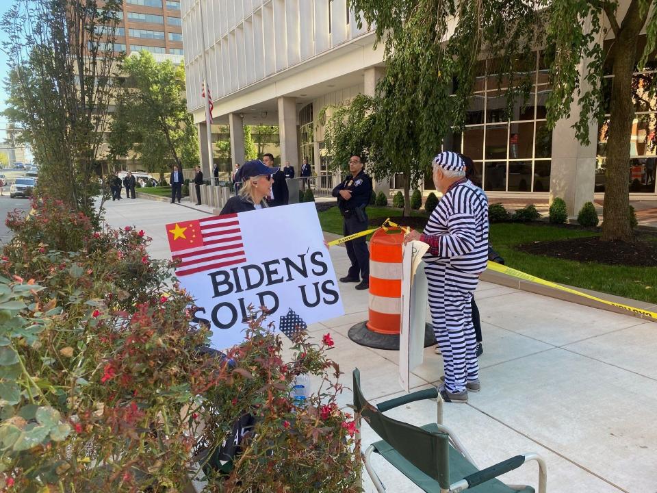 As this Maryland woman, who went by Anonymous, was allowed into the protest area outside the federal courthouse about 9:20 a.m. a woman across King Street began shouting that Hunter Biden is receiving special privileges.