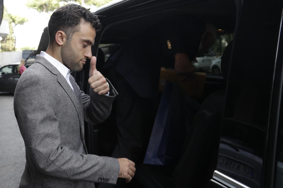 Soccer player Giuseppe Rossi leaves after being heard by a CONI (Italian Olympic committee) anti-doping commission, in Rome, Monday, Oct. 1, 2018. (AP Photo/Andrew Medichini)