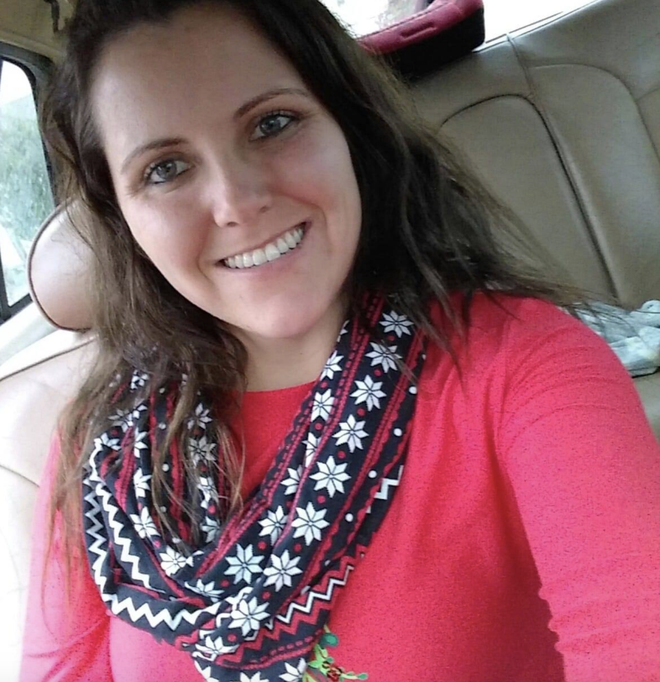 Photo shows Natalie Jones sitting in a car smiling.