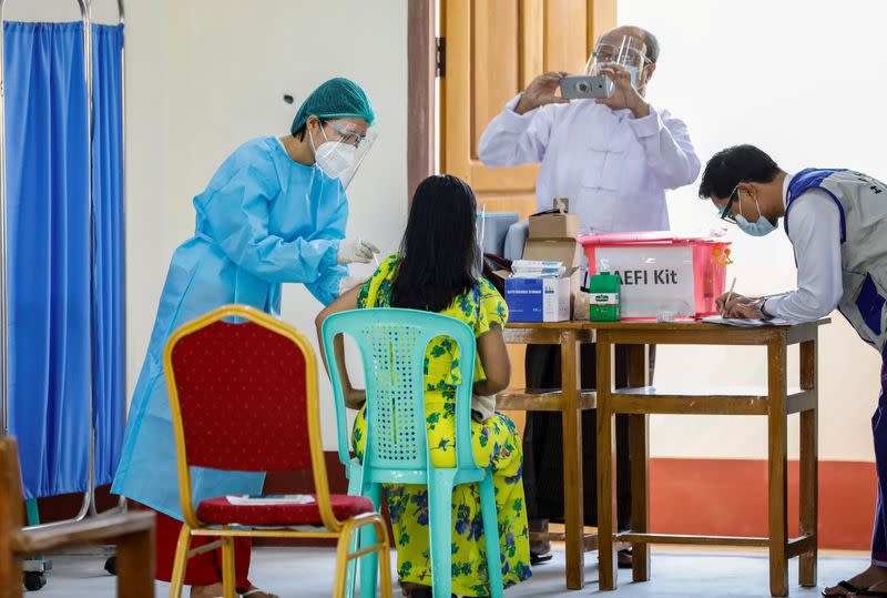 FILE PHOTO: Myanmar starts vaccinating frontline medical workers