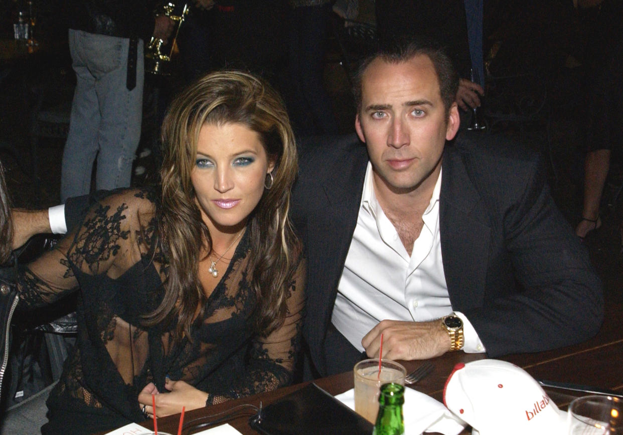 Lisa Marie Presley and Nicolas Cage (Photo by L. Busacca/WireImage)