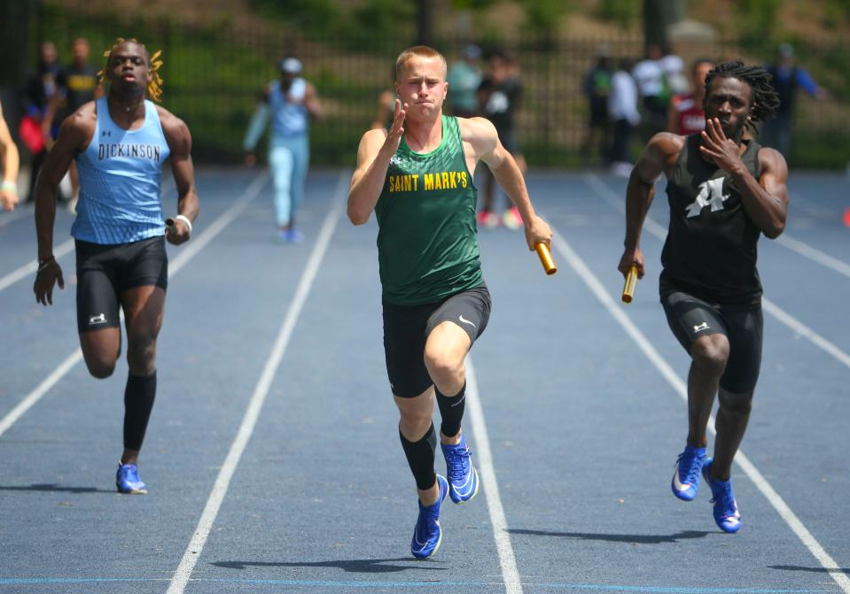 Saint Mark's Chad Dohl (center) anchors his team to a win in the 4x100 meter race during the New Castle County track and field championships, Saturday, May 11, 2024 at Abessinio Stadium. Dohl earlier won the 100 meter dash.
