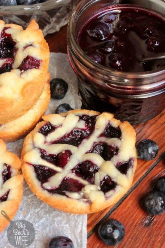 <p>bigbearswife.com</p><p>These little Blueberry Pie Sugar Cookies are filled with an amazing but easy homemade blueberry pie filling! While they look like mini pies, they’re actually sugar cookies! </p><p><strong>Get the recipe:</strong> <a href="http://www.bigbearswife.com/blueberry-pie-sugar-cookies/" rel="nofollow noopener" target="_blank" data-ylk="slk:Blueberry Pie Sugar Cookies;elm:context_link;itc:0;sec:content-canvas" class="link "><strong>Blueberry Pie Sugar Cookies</strong></a></p><p><strong>Related: </strong><a href="https://parade.com/170361/parade/blueberry-maple-pie-with-a-flakey-cinnamon-butter-crust/" rel="nofollow noopener" target="_blank" data-ylk="slk:Blueberry Maple Pie with a Flakey Cinnamon-Butter Crust;elm:context_link;itc:0;sec:content-canvas" class="link "><strong>Blueberry Maple Pie with a Flakey Cinnamon-Butter Crust</strong></a></p>