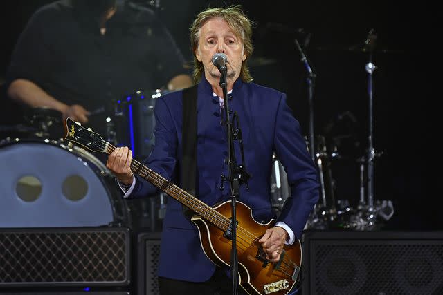 <p>Joe Marino/UPI/Shutterstock </p> Paul McCartney performing at Camping World Stadium in Orlando, Florida in May 2022