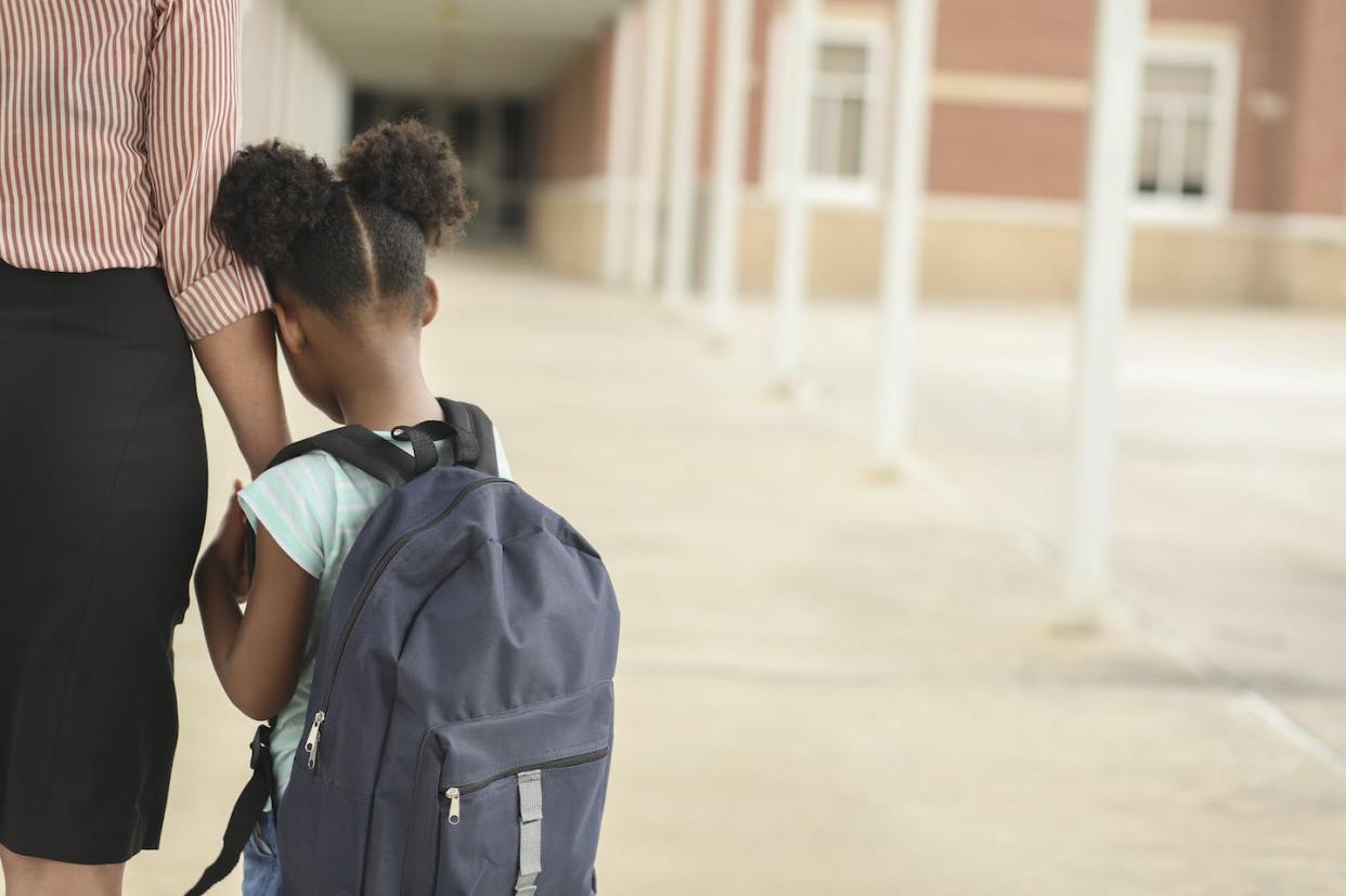 Simply returning to a school where a shooting took place can be a struggle for many students. <a href="https://www.gettyimages.com/detail/photo/elementary-african-american-girl-with-mom-on-first-royalty-free-image/1152649948?phrase=fearful%20students&adppopup=true" rel="nofollow noopener" target="_blank" data-ylk="slk:fstop123 via Getty Images;elm:context_link;itc:0;sec:content-canvas" class="link ">fstop123 via Getty Images</a>