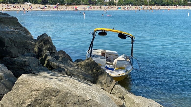 Emergency crews were called about a boat crash near Woodbine Beach Thursday. (Paul Borkwood/CBC)