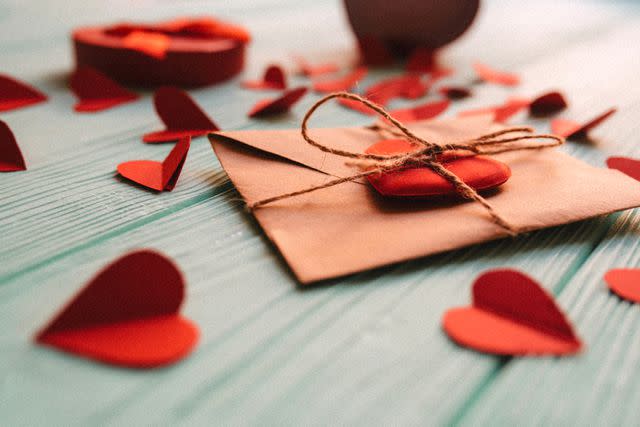 <p>Getty</p> Red paper hearts.