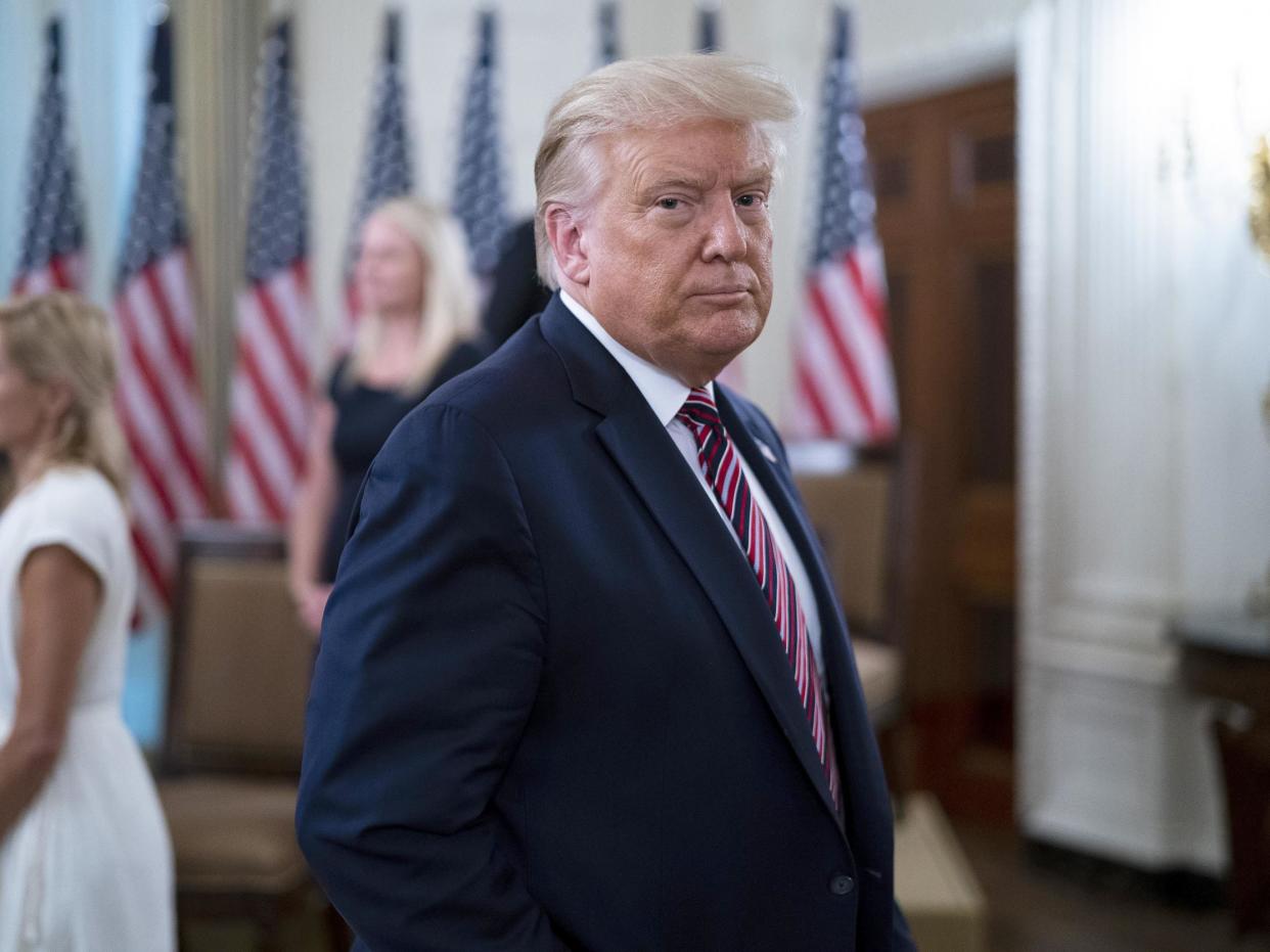 US president Donald Trump departs an event titled "Kids First: Getting America's Children Safely Back to School" 12 August 2020 in the State Dining Room at the White House in Washington, DC: (2020 Getty Images)