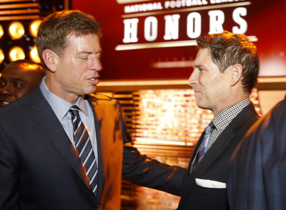 Former NFL players Troy Aikman, left, and Steve Young are seen backstage at the 4th annual NFL Honors at the Phoenix Convention Center Symphony Hall on Saturday, Jan. 1, 2015. (Photo by Colin Young-Wolff/Invision for NFL/AP Images)