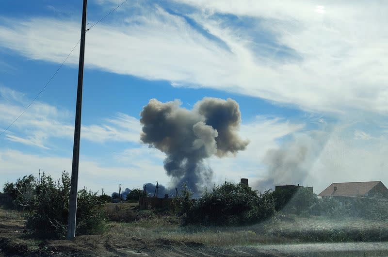 Smoke rises after explosions were heard near Novofedorivka