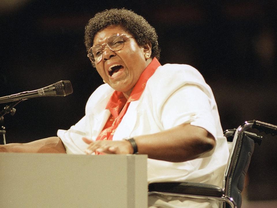 Barbara Jordan speaks at the 1992 Democratic National Convention. She uses a wheelchair.