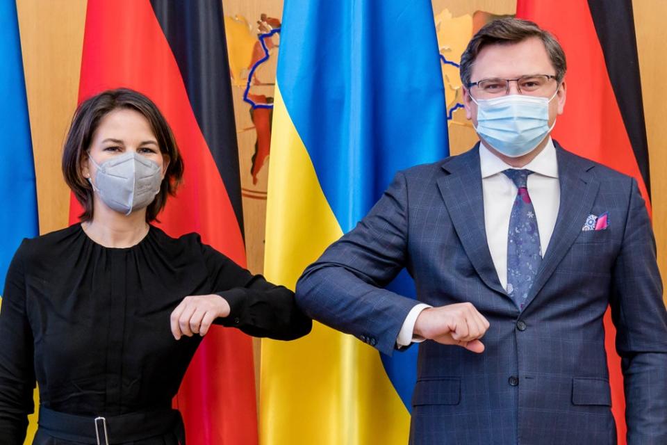 German Foreign Minister Annalena Baerbock (left) and her Ukrainian counterpart Dmytro Kuleba greeting each other in Kyiv, Ukraine (AP)