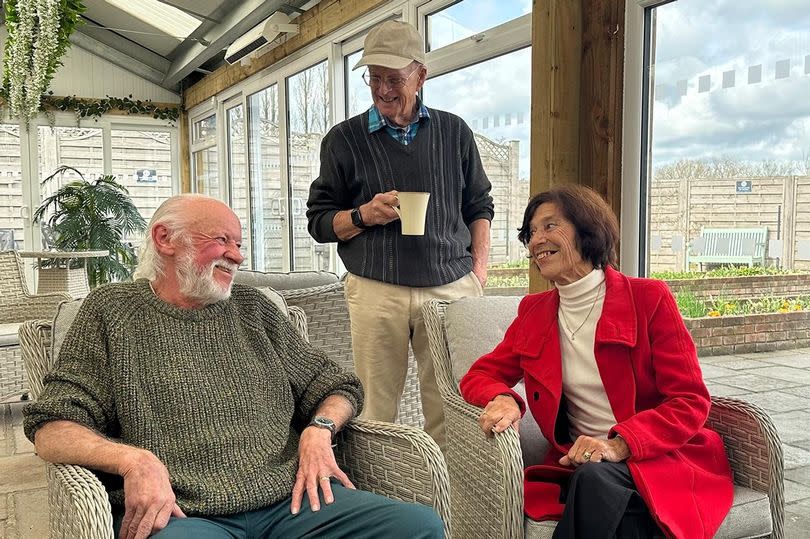 Left, Nigel Blackmore, one of the first employees of Otter Garden Centres, reconnects with founders Malcolm and Marilyn White -Credit:Otter Garden Centres