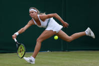 LONDON, ENGLAND - JULY 02: Maria Kirilenko of Russia in action during her Ladies' singles fourth round match against Shuai Peng of China on day seven of the Wimbledon Lawn Tennis Championships at the All England Lawn Tennis and Croquet Club on July 2, 2012 in London, England. (Photo by Julian Finney/Getty Images)