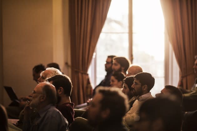 Audience members at the Royal Society’s “New Trends in Evolutionary Biology” conference.<br> (Tom Parker / Quanta Magazine)