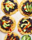 <p>You can always add on additional toppings like <a href="https://www.delish.com/cooking/recipe-ideas/recipes/a53802/best-corn-salsa-recipe/" rel="nofollow noopener" target="_blank" data-ylk="slk:corn salsa;elm:context_link;itc:0;sec:content-canvas" class="link ">corn salsa</a>, <a href="https://www.delish.com/cooking/recipe-ideas/recipes/a54876/avocado-ranch-recipe/" rel="nofollow noopener" target="_blank" data-ylk="slk:avocado ranch;elm:context_link;itc:0;sec:content-canvas" class="link ">avocado ranch</a>, or endless crunchy veggies like radishes or <a href="https://www.delish.com/cooking/recipe-ideas/a27245453/pickled-red-onions-recipe/" rel="nofollow noopener" target="_blank" data-ylk="slk:pickled red onions;elm:context_link;itc:0;sec:content-canvas" class="link ">pickled red onions</a>, but here we keep things simple. With ingredients you're likely to have on hand, these tostadas make for a last minute, easy meal you'll have on repeat.</p><p>Get the <strong><a href="https://www.delish.com/cooking/recipe-ideas/a35195090/black-bean-tostada-recipe/" rel="nofollow noopener" target="_blank" data-ylk="slk:5-Ingredient Black Bean Tostadas recipe.;elm:context_link;itc:0;sec:content-canvas" class="link ">5-Ingredient Black Bean Tostadas recipe.</a></strong></p>