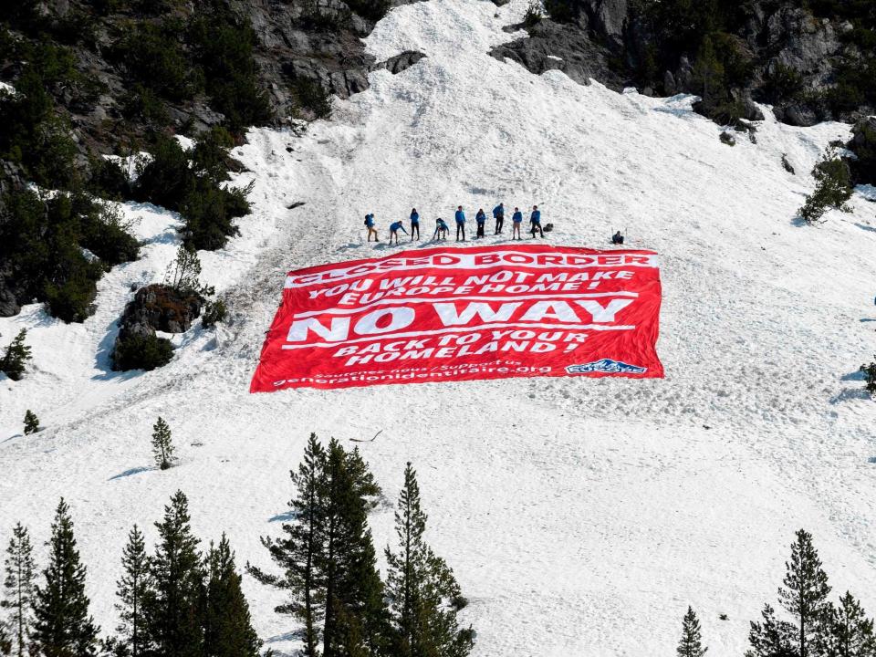 Three members of the far-right group Generation Identity have been jailed for an anti-migrant stunt in the French Alps: Romain Lafabregue/AFP/Getty Images