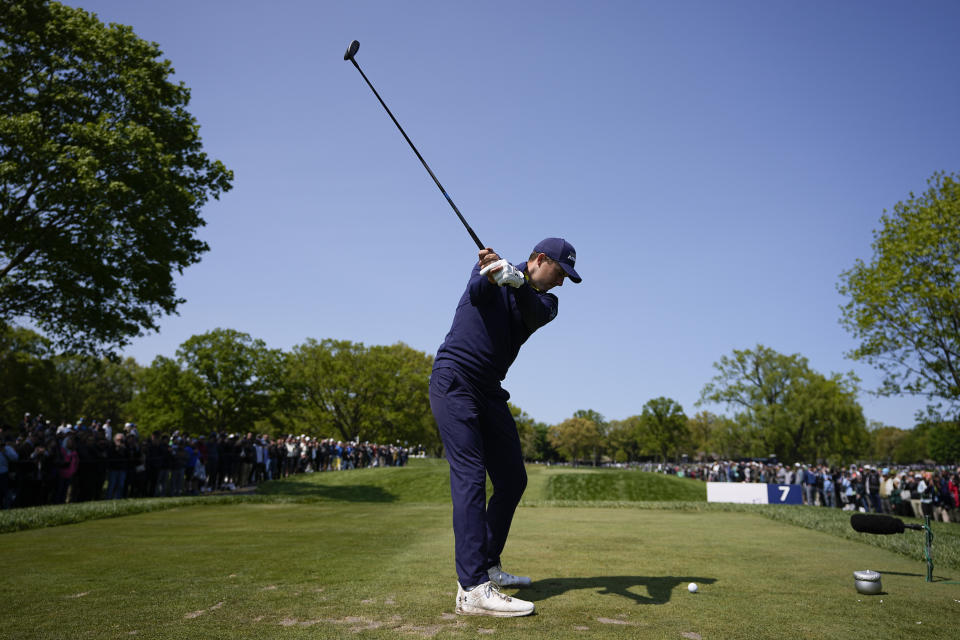 Jordan Spieth hits his tee shot on the seventh hole during a practice round for the PGA Championship golf tournament at Oak Hill Country Club on Wednesday, May 17, 2023, in Pittsford, N.Y. (AP Photo/Eric Gay)