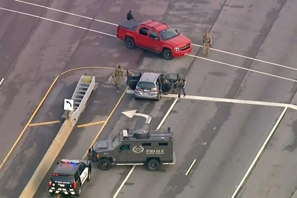 <div class="inline-image__caption"><p>Police search the vehicle which Robert E. Crimo III was driving when he was taken into custody after a brief chase.</p></div> <div class="inline-image__credit">WLS-TV/ABC7 via Reuters</div>