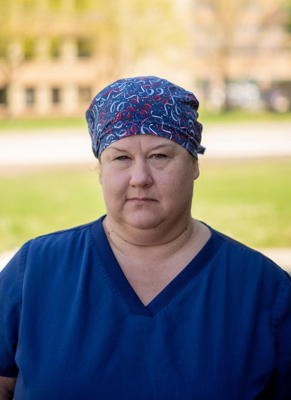 McLaren Macomb nurse Terri Dagg-Barr stands outside of McLaren Macomb Hospital in Mt. Clemens on Friday, April 9, 2021. Dagg-Barr, Nurse Chief Steward with OPEIU Local 40, is one of the countless health care workers feeling overwhelmed. 