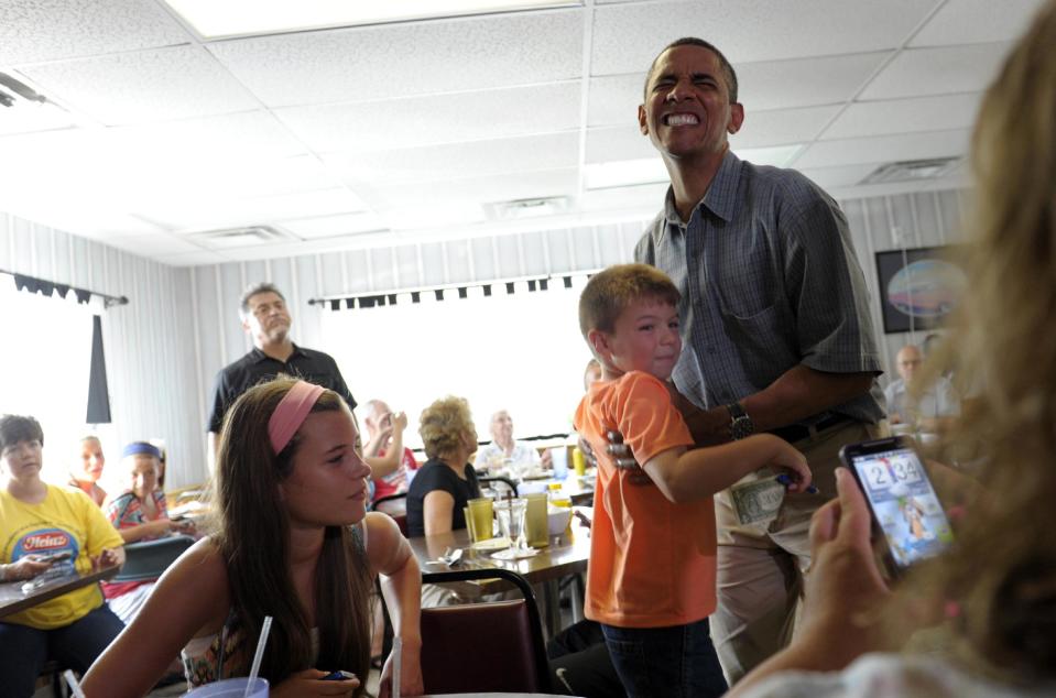 President Barack Obama visits the Kozy Corner diner in Oak Harbour, Ohio, Thursday, July 5, 2012. Obama is on a two-day bus trip through Ohio and Pennsylvania. (AP Photo/Susan Walsh)