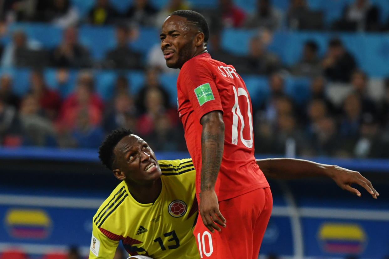 Colombia’s defender Yerry Mina (L) and England’s forward Raheem Sterling during the Russia 2018 World Cup round of 16 football match between Colombia and England at the Spartak Stadium in Moscow on July 3, 2018. (Getty Images)