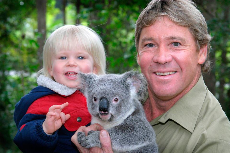 'Crocodile Hunter' Steve Irwin with his son, Bob Irwin, and a Koala at Australia Zoo.