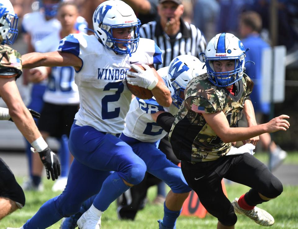 Windber tailback John Shuster carries during a WestPAC football game against Conemaugh Valley on Aug. 28, in East Taylor Township.