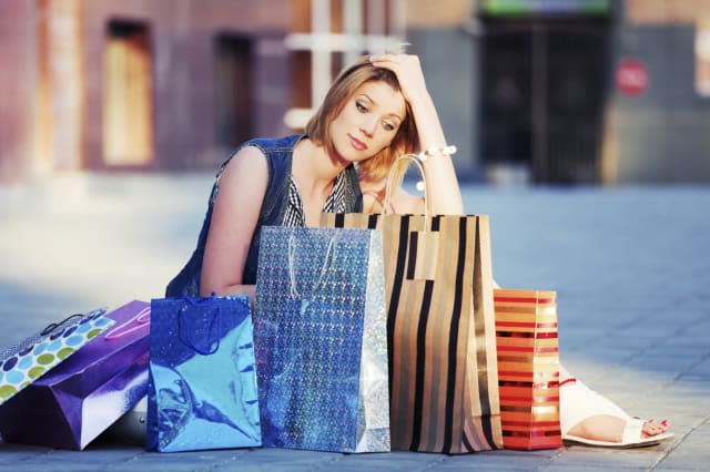 Young woman with shopping bags