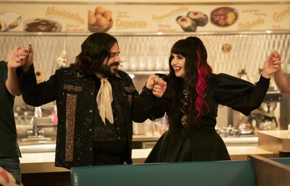 “WHAT WE DO IN THE SHADOWS” Season 5 — Pictured (L-R): Natasia Demetriou as Nadja, Matt Berry as Laszlo