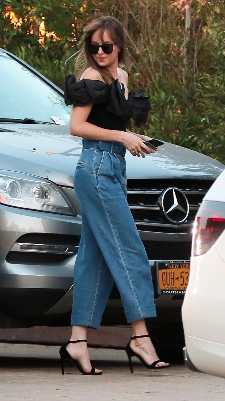 <p>WHO: Dakota Johnson</p> <p>WHAT: Isa Arfen</p> <p>WHERE: On the street, Malibu</p> <p>WHEN: July 10, 2018</p>