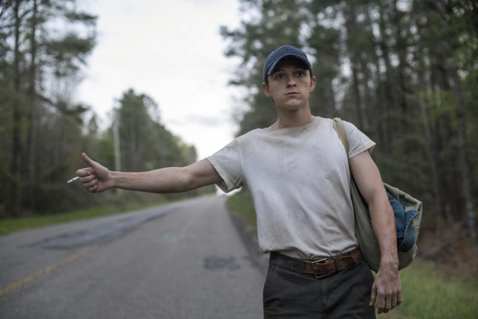 This image released by Netflix shows Tom Holland in a scene from "The Devil All The Time." (Glen Wilson/Netflix via AP)