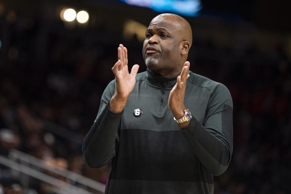 Atlanta Hawks head coach Nate McMillan reacts during the first half of an NBA basketball game against the Brooklyn Nets, Wednesday, Dec. 28, 2022, in Atlanta. (AP Photo/Hakim Wright Sr.)