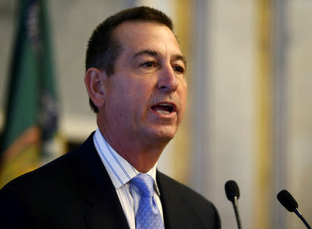 FILE PHOTO: Joseph M. Otting speaks after being sworn in as Comptroller of the Currency in Washington, U.S., November 27, 2017. REUTERS/Joshua Roberts/File Photo