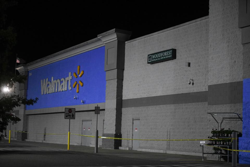 FILE - Police tape lines the front of the Walmart Supercenter off Whiskey Road in Aiken on Wednesday, June 7, 2023. A second shooting occurred here on Nov. 26. Arrests have been made in both incidents.