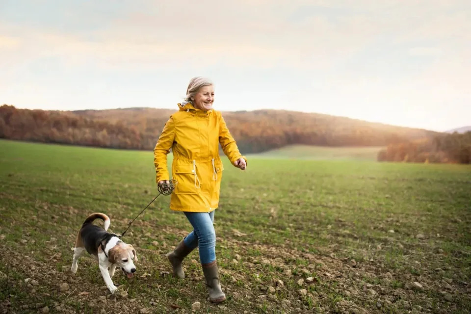 Woman walking dog