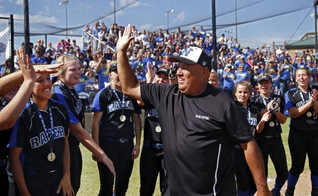 Newcastle gave softball coach Mike Crossley, center, his 1,000th win on Monday. Crossley has been the Racers' head coach for 35 years. [OKLAHOMAN ARCHIVES]